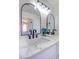 A bathroom vanity showcases dual sinks, marble countertops, and modern mirrors at 2204 Brighton Shore St, Las Vegas, NV 89128