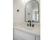 Close up of bathroom featuring a marble countertop, modern faucet, and under-cabinet storage at 2204 Brighton Shore St, Las Vegas, NV 89128