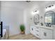 Bright bathroom with double vanity, marble countertop, and a modern mirror at 2204 Brighton Shore St, Las Vegas, NV 89128