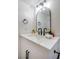 Updated bathroom features a modern vanity with white countertop and black hardware at 2204 Brighton Shore St, Las Vegas, NV 89128