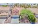 Beautiful home showcasing tile roof, well-manicured landscaping, and inviting curb appeal at 2204 Brighton Shore St, Las Vegas, NV 89128