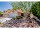 Charming two-story home with mature desert landscaping and a spacious two car garage at 2204 Brighton Shore St, Las Vegas, NV 89128