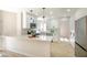 Renovated kitchen with white cabinets, quartz countertops, and stainless steel appliances at 2204 Brighton Shore St, Las Vegas, NV 89128