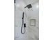Modern shower featuring marble-patterned tiling, matte black fixtures, and a built-in shower niche at 2204 Brighton Shore St, Las Vegas, NV 89128