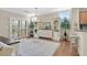 Open-concept dining area featuring hardwood floors and natural light at 2385 Orangeburg Pl, Henderson, NV 89044
