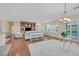 Bright living room with wood floors and view to backyard at 2385 Orangeburg Pl, Henderson, NV 89044