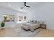 Spacious main bedroom featuring a cozy sitting area and scenic backyard views at 2475 Sedona Cedar Ave, Henderson, NV 89052