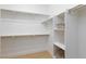 Spacious walk-in closet with open shelving and plenty of storage space at 2475 Sedona Cedar Ave, Henderson, NV 89052