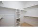 Walk-in closet with white shelving and ample hanging space at 2475 Sedona Cedar Ave, Henderson, NV 89052