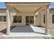 Spacious covered patio with a concrete floor, perfect for outdoor entertaining and relaxation at 2475 Sedona Cedar Ave, Henderson, NV 89052