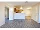 Spacious living area featuring wood-look floors and an open layout at 2705 Jennydiane Dr, Las Vegas, NV 89121