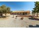 Expansive backyard with gravel landscaping and a patio area for outdoor enjoyment at 2730 Banyon St, Pahrump, NV 89048