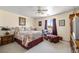 Cozy bedroom features a ceiling fan, natural light, and a relaxing sitting area at 2730 Banyon St, Pahrump, NV 89048