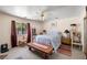 Cozy bedroom with ceiling fan, and natural lighting at 2730 Banyon St, Pahrump, NV 89048