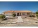 Charming single-story home with well-maintained landscaping and a tile roof at 2730 Banyon St, Pahrump, NV 89048