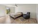 Bright, spacious bedroom with a ceiling fan, vinyl plank flooring, and lots of natural light at 2845 Loveland Dr # 3615, Las Vegas, NV 89109