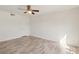 Bright bedroom with light-wood floors, white walls, and ceiling fan fixture at 2845 Loveland Dr # 3615, Las Vegas, NV 89109