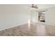 Bright, airy bedroom with wood-look floors and a large window at 2845 Loveland Dr # 3615, Las Vegas, NV 89109