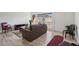Inviting living room with modern flooring, a comfortable sofa, and plenty of natural light at 2845 Loveland Dr # 3615, Las Vegas, NV 89109