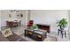 Open concept living room and dining area with wood-style flooring and lots of natural light at 2845 Loveland Dr # 3615, Las Vegas, NV 89109