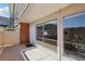 Private patio with brick and fence borders, leading to the home's entrance at 2845 Loveland Dr # 3615, Las Vegas, NV 89109