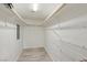 Walk-in closet with wire shelves and wood-look flooring at 2845 Loveland Dr # 3615, Las Vegas, NV 89109