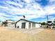 Large exterior featuring a white building with a two-car garage, a pool and space for parking an RV at 2903 Hardin Dr, Henderson, NV 89074