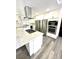 Gourmet kitchen featuring a stainless steel refrigerator, built-in ovens, and a gas cooktop on the island at 2903 Hardin Dr, Henderson, NV 89074