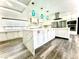 Spacious kitchen featuring an oversized island, stainless steel appliances, and modern pendant lighting at 2903 Hardin Dr, Henderson, NV 89074
