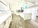 Large kitchen with stainless appliances, modern countertops, and island providing ample counter space at 2903 Hardin Dr, Henderson, NV 89074