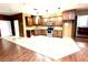 This kitchen features wood cabinets, stainless steel appliances, and tile flooring at 2903 Hardin Dr, Henderson, NV 89074