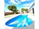 Sparkling blue swimming pool with a surrounding patio, perfect for hot summer days at 2903 Hardin Dr, Henderson, NV 89074