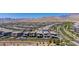Beautiful aerial view of neighborhood with desert mountains in background at 312 Wind Poppy St, Las Vegas, NV 89138