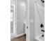 Modern bathroom features tub/shower combo, tile surround, and wood look flooring at 312 Wind Poppy St, Las Vegas, NV 89138