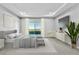 Staged primary bedroom with modern decor and sliding glass doors to the balcony at 312 Wind Poppy St, Las Vegas, NV 89138