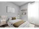 Modern bedroom with a cozy bed and bright natural light at 312 Wind Poppy St, Las Vegas, NV 89138