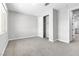 Bright, neutral bedroom with carpet and a closet at 312 Wind Poppy St, Las Vegas, NV 89138