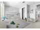 This staged bedroom features bunk beds, and a table and chairs for play at 312 Wind Poppy St, Las Vegas, NV 89138