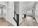 Inviting entryway with light wood floors and views of the kitchen at 312 Wind Poppy St, Las Vegas, NV 89138
