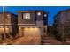 New two-story home with brick driveway and two-car garage at 312 Wind Poppy St, Las Vegas, NV 89138