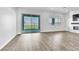 Open-concept living area with sliding glass doors to the backyard at 312 Wind Poppy St, Las Vegas, NV 89138