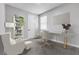 Home office boasts ample natural light with a modern aesthetic at 312 Wind Poppy St, Las Vegas, NV 89138