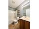 Full bathroom with shower-tub combo, tile flooring, and neutral vanity at 3412 Catherine Mermet Ave, North Las Vegas, NV 89081