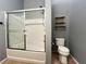 Well-lit bathroom showcasing a shower-over-tub and tiled flooring at 3412 Catherine Mermet Ave, North Las Vegas, NV 89081