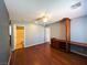 Open-concept bedroom featuring hardwood flooring and natural light at 3412 Catherine Mermet Ave, North Las Vegas, NV 89081