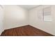 Bright, unfurnished bedroom featuring wood floors and a closet at 3597 Cherbourg Ave, Las Vegas, NV 89141
