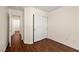 Cozy bedroom featuring wood floors and a closet space at 3597 Cherbourg Ave, Las Vegas, NV 89141