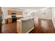 Spacious kitchen featuring an island, oak cabinetry, and appliances at 3597 Cherbourg Ave, Las Vegas, NV 89141