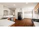 Modern kitchen showcasing updated appliances and a view into the adjacent breakfast nook at 3597 Cherbourg Ave, Las Vegas, NV 89141