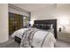 Bedroom featuring a padded headboard and a beautiful city view at 3722 Las Vegas Blvd # 2512 E, Las Vegas, NV 89158
